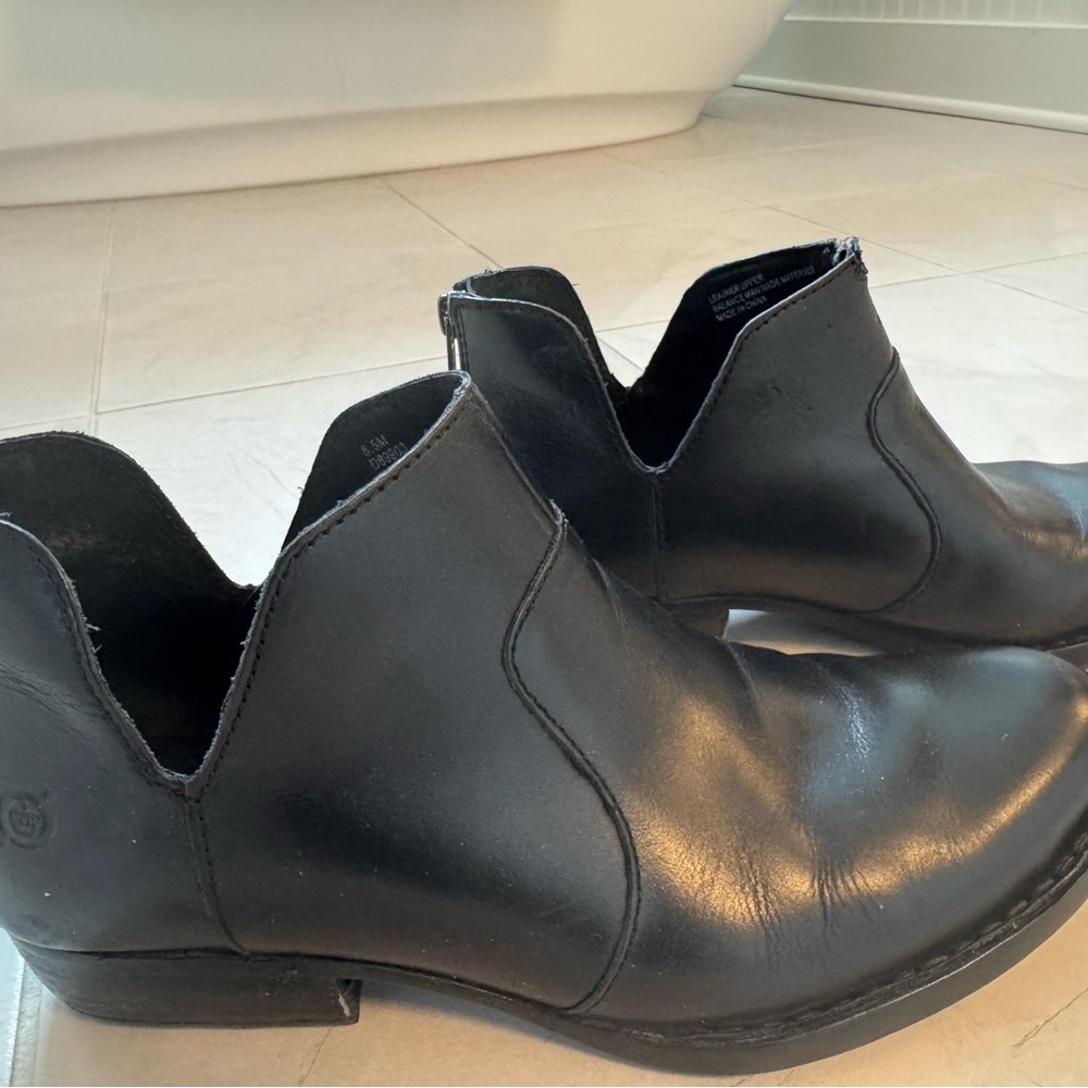 Born Brand Black Booties.  Damage to left boot only. Shown in photo.